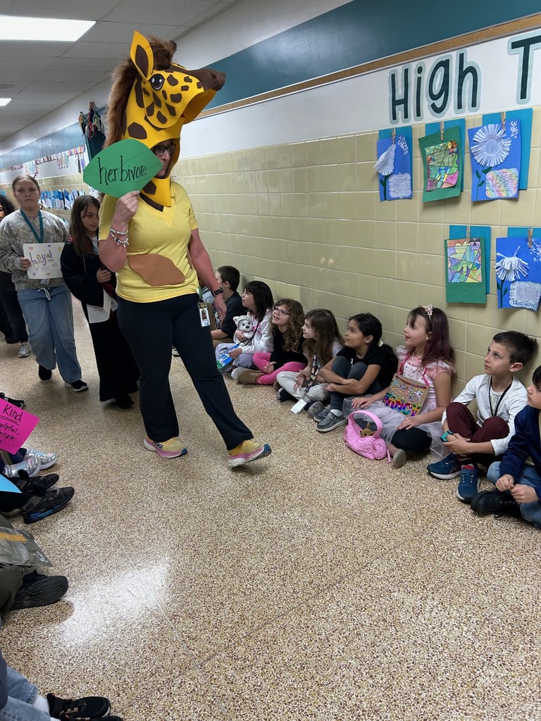 students walking in a parade dressed up for the vocabulary parade