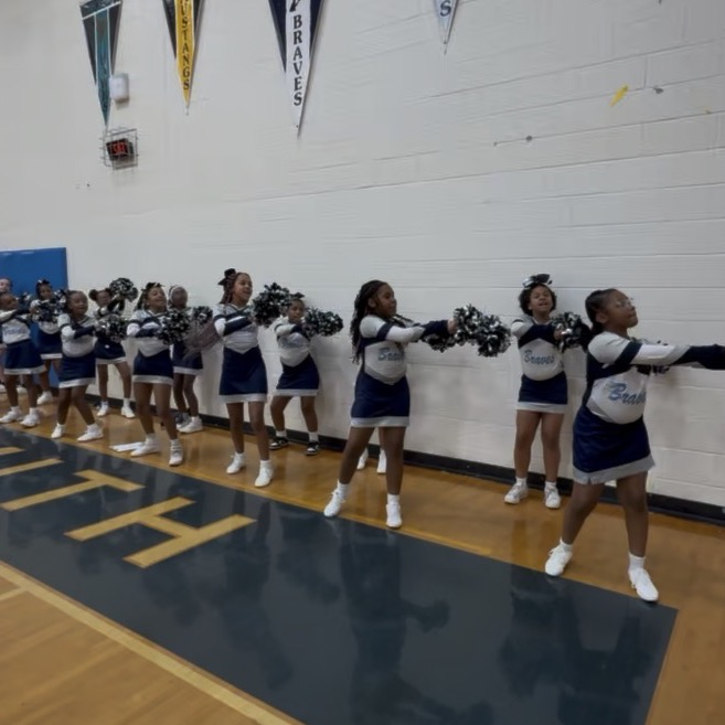 showing our cheer team in action