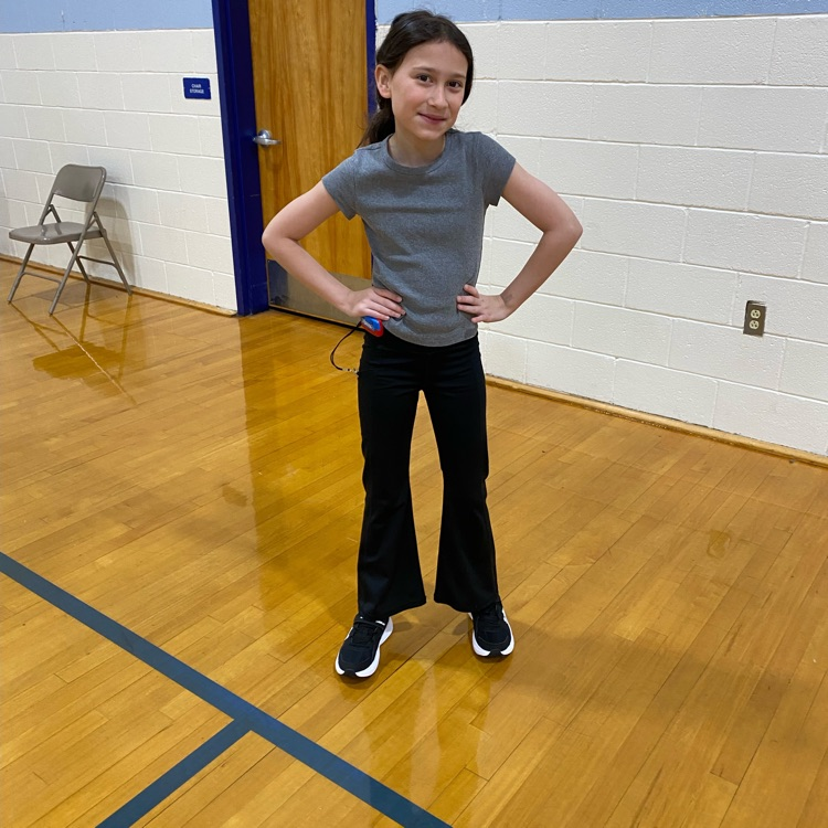 student showing off her new sneakers