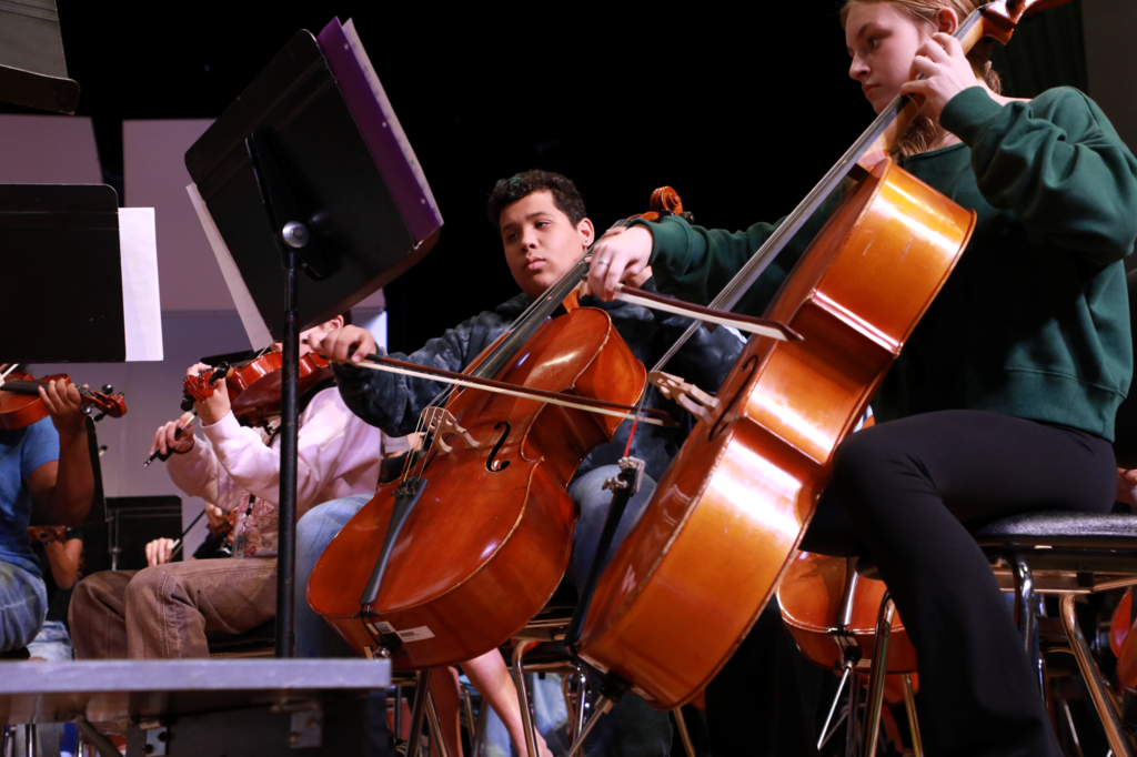 cello students playing with passion