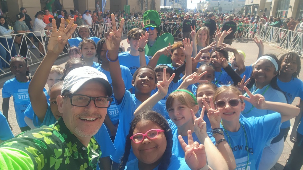 Selfie of students and staff in the corral and getting pumped up for the race!