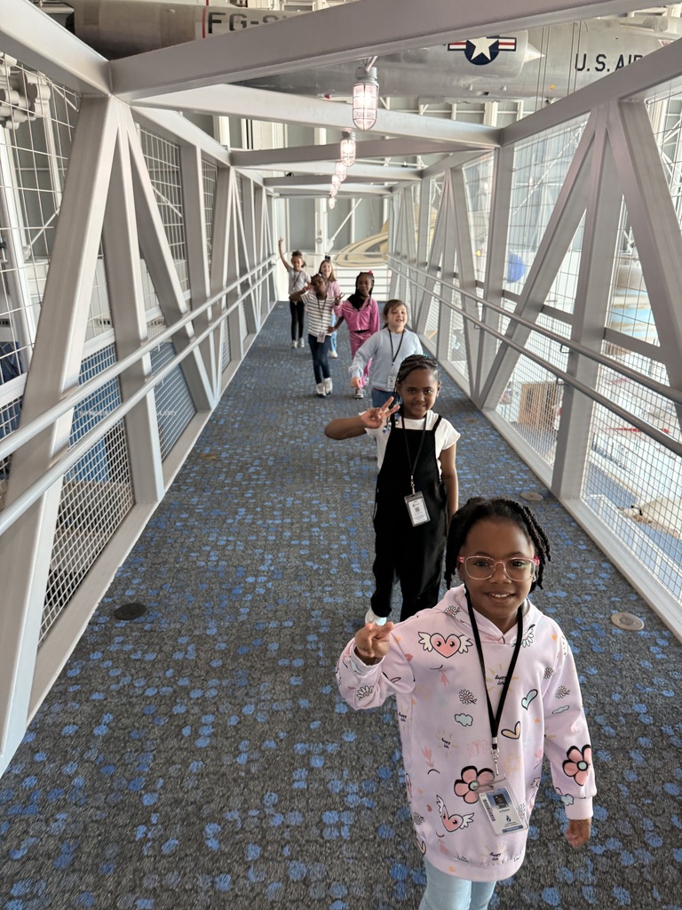 students walking in a line on a breezeway