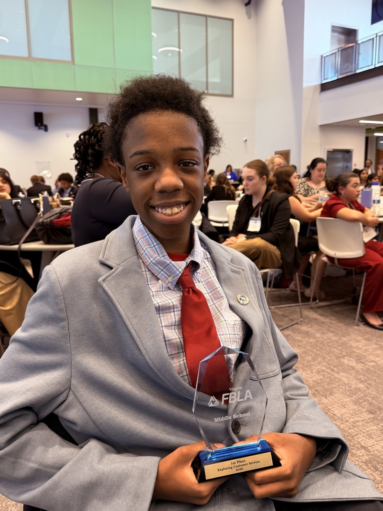 student with award at FBLA competition 