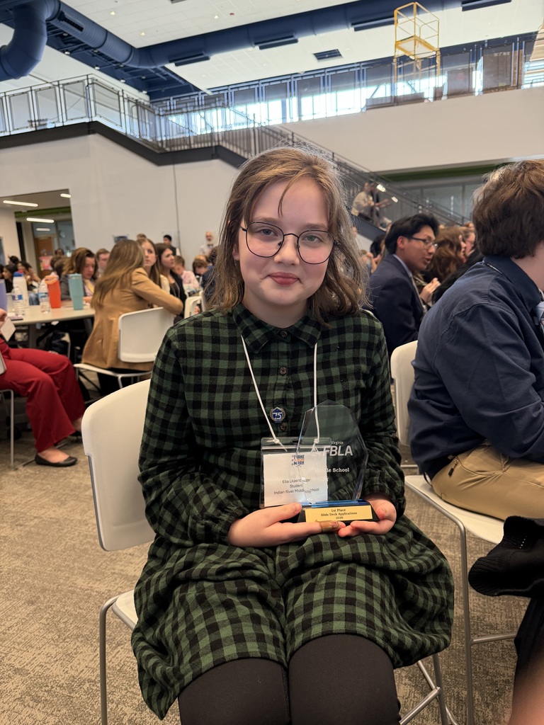 student with award at FBLA competition 