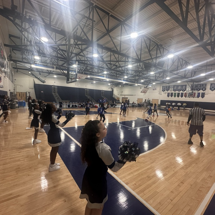 SRI cheer team cheering our SRI basketball team on! 