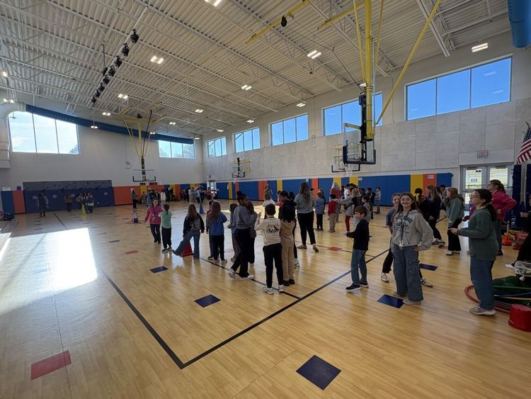 students playing an activity in the gym! All students who signed up by this morning got to celebrate together! 