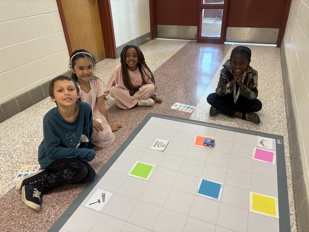 Ms. Krell's 2nd graders using robotics to answer literacy questions