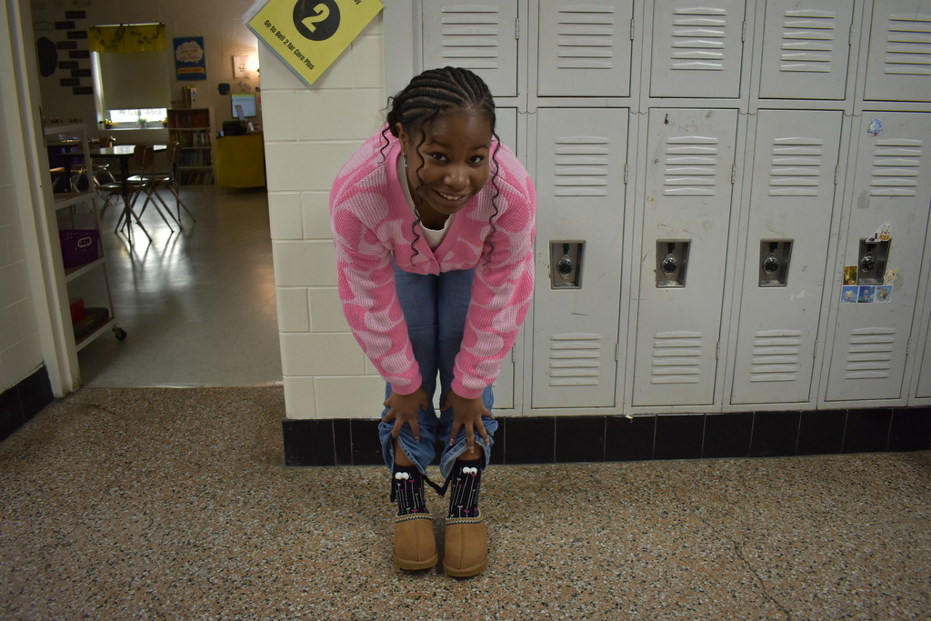 A student showing off her fun sock