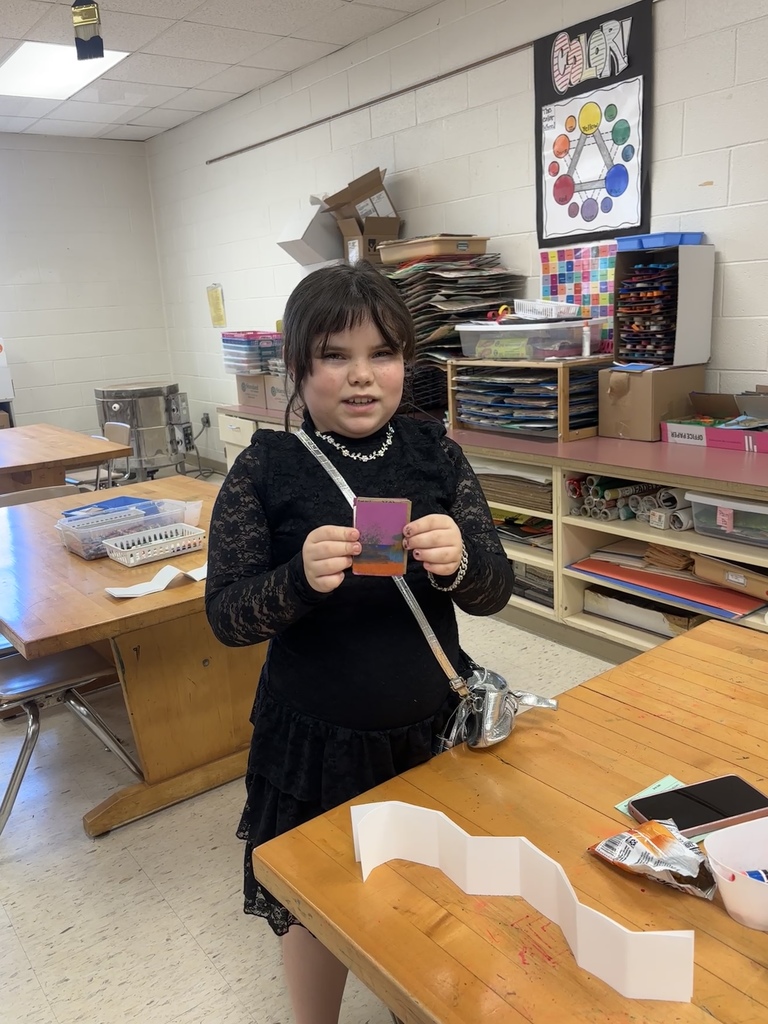 Student making a book 