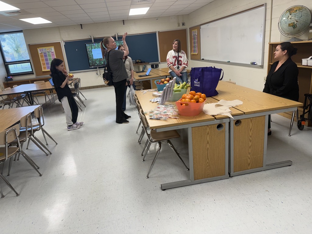Families exploring the healthy food options!
