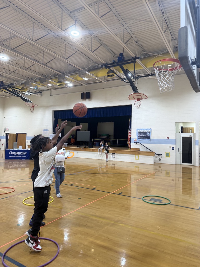 Student and coach focused on shooting the basketball!