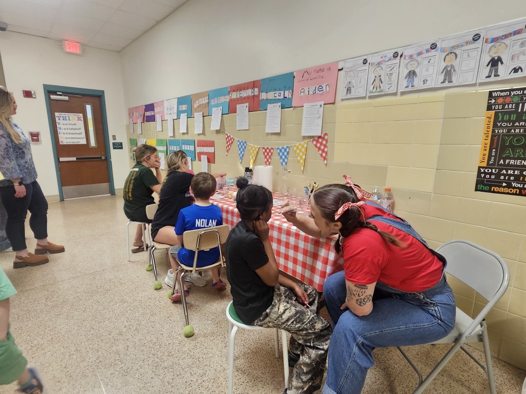 students getting their face painted
