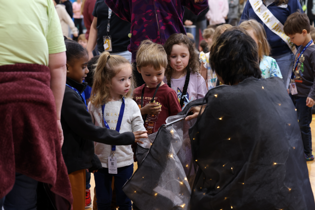 students in awe of one of the high school performers