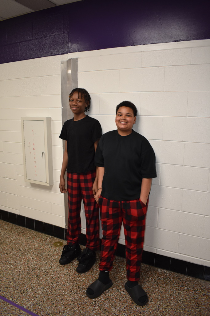 Two students in matching pajamas