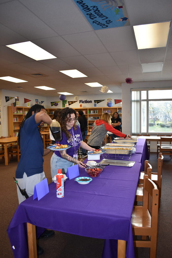 Teachers grabbing their yummy pancake breakfast!