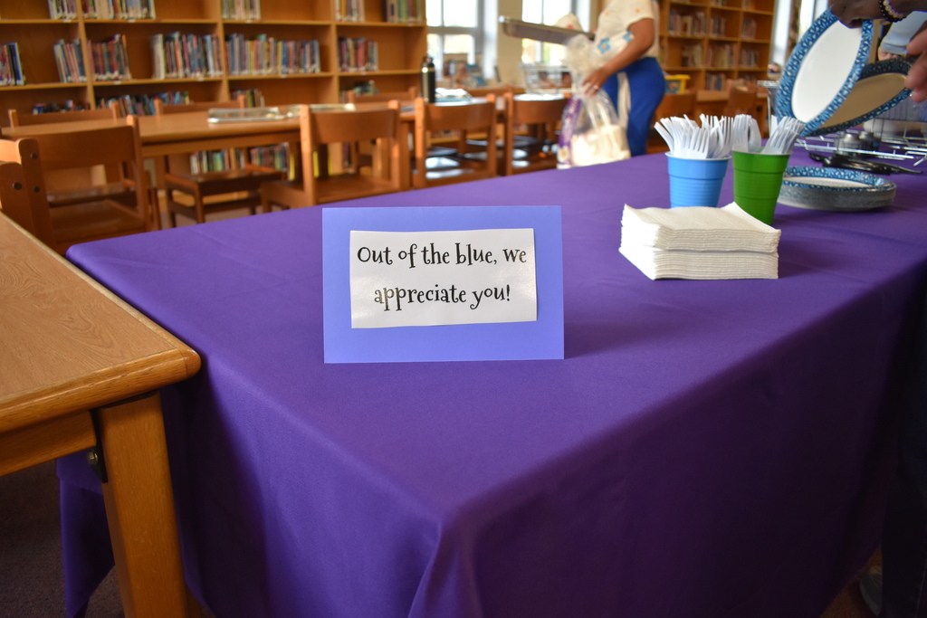 A sign that reads "Out of the Blue, We appreciate you!"