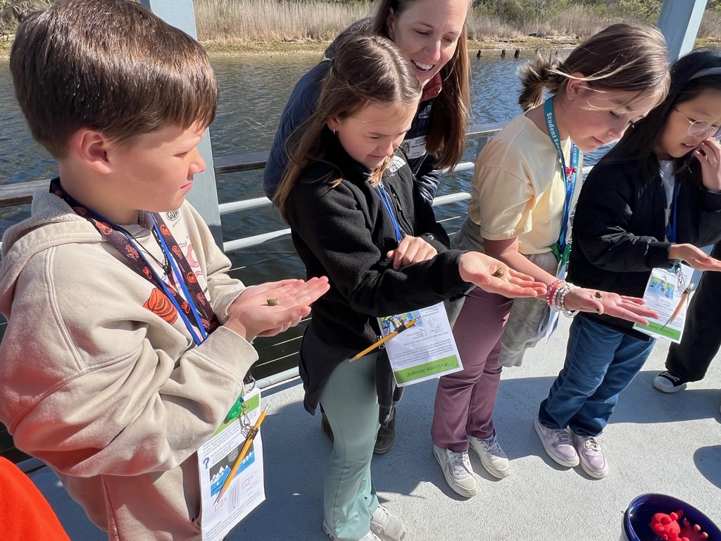 students exploring on the learning barge 