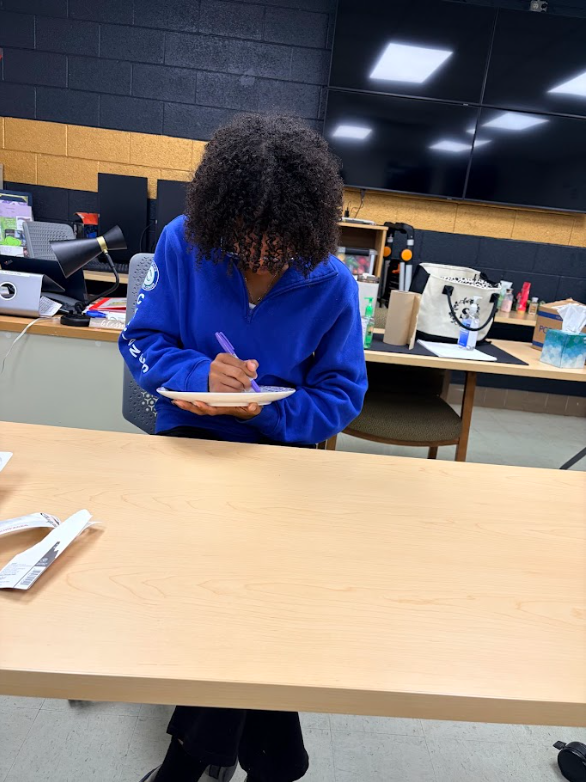 Students writing their worries away