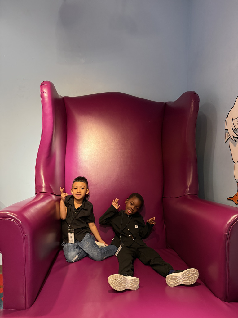 2 Students on large chair