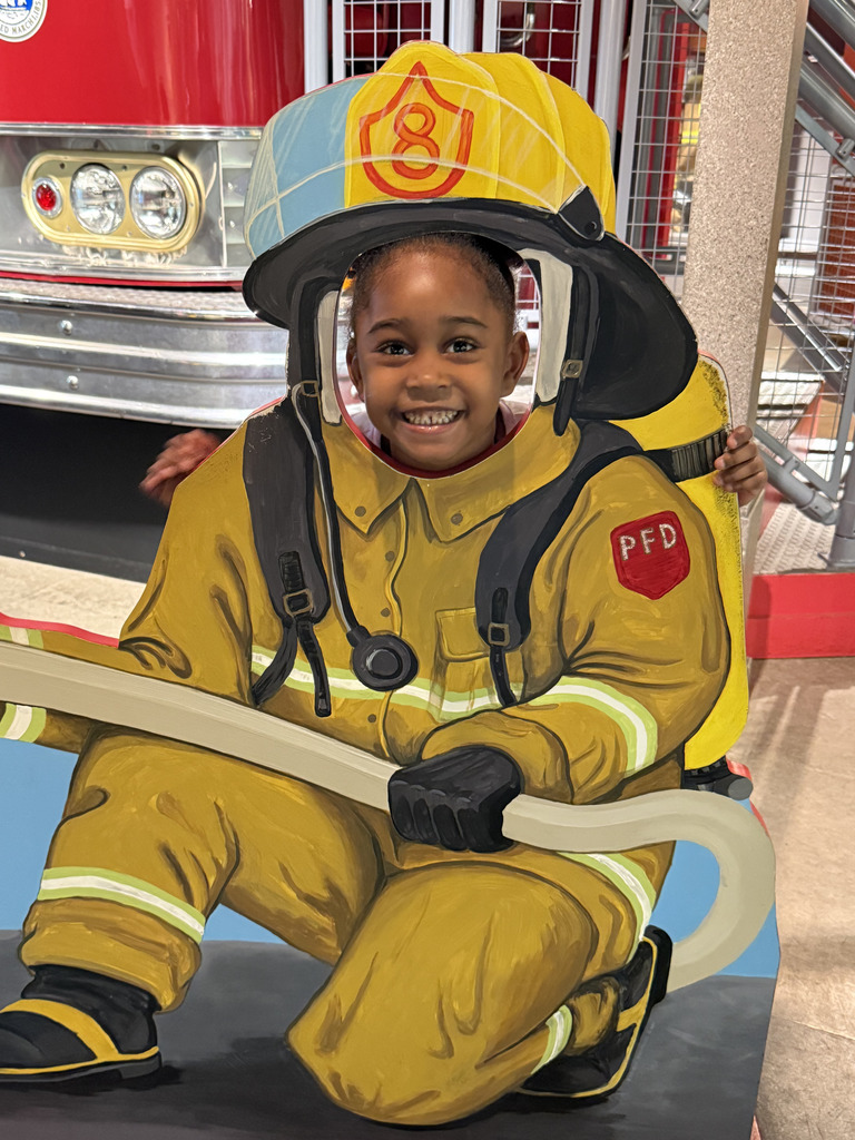 Student posing as a firefighter