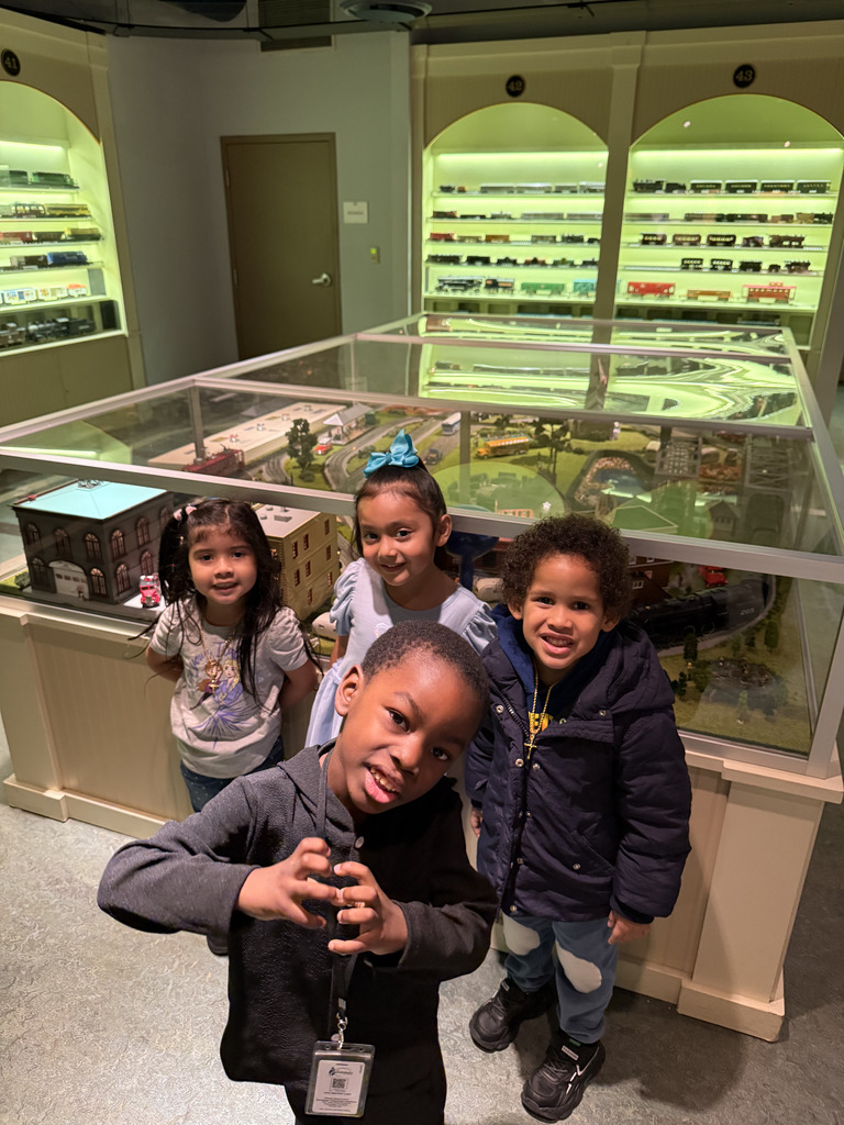 Students in train room at Children's Museum