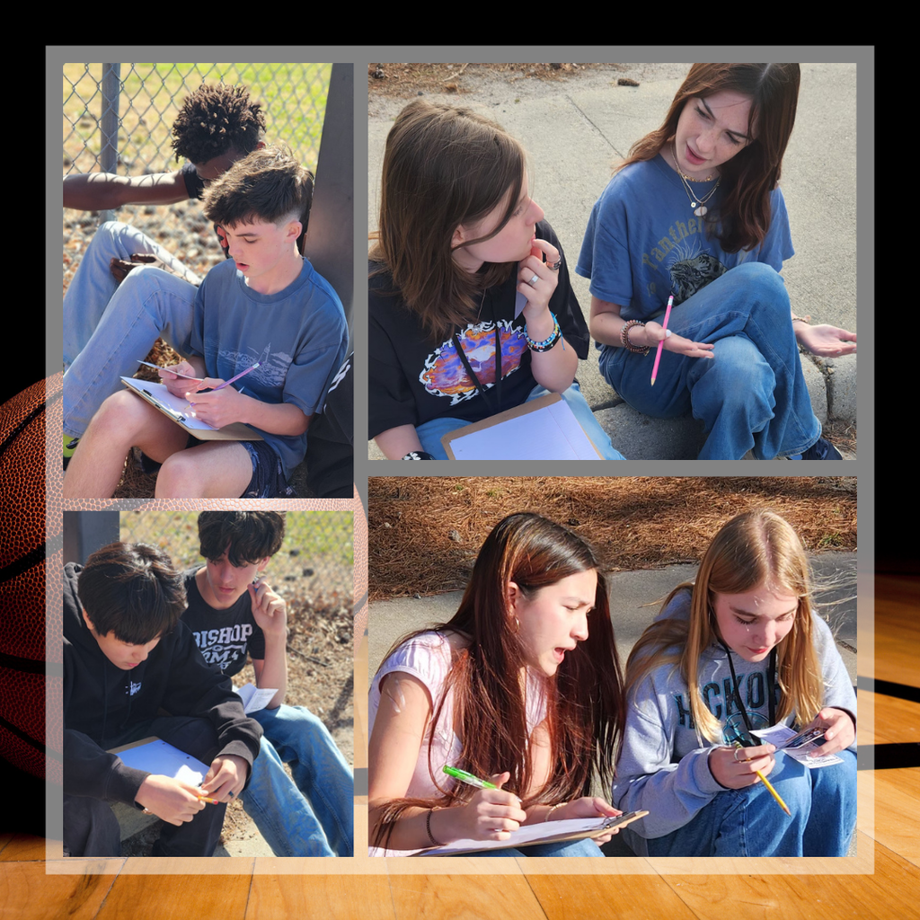 Students working together to review essay writing