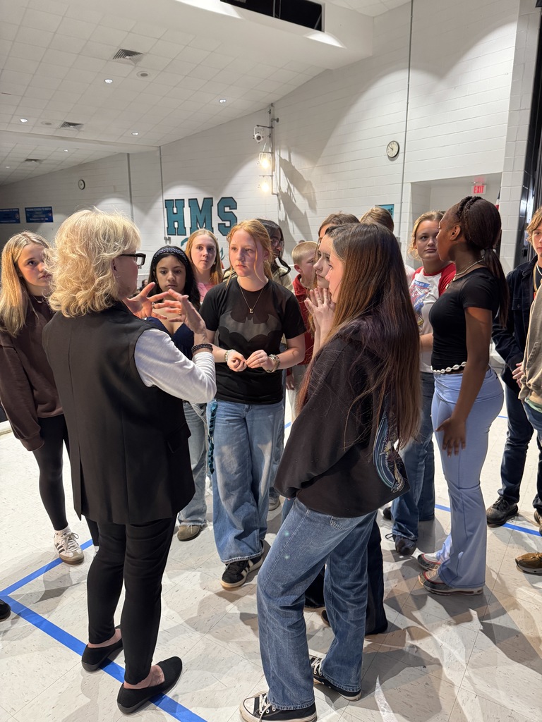 Our guest speaker talking with a small group of interested students