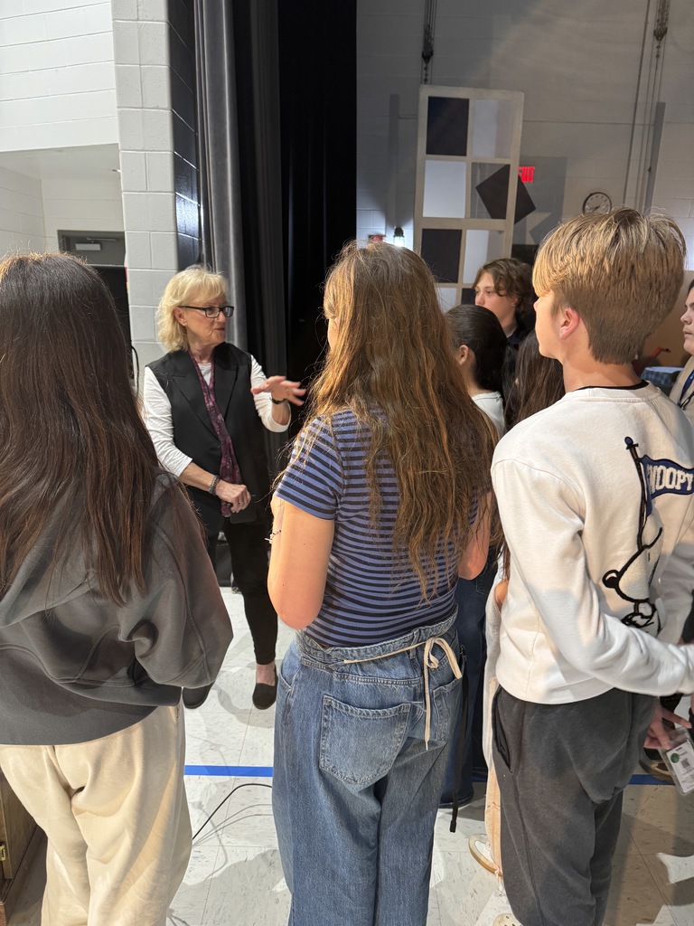 Our guest speaker talking with a small group of interested students