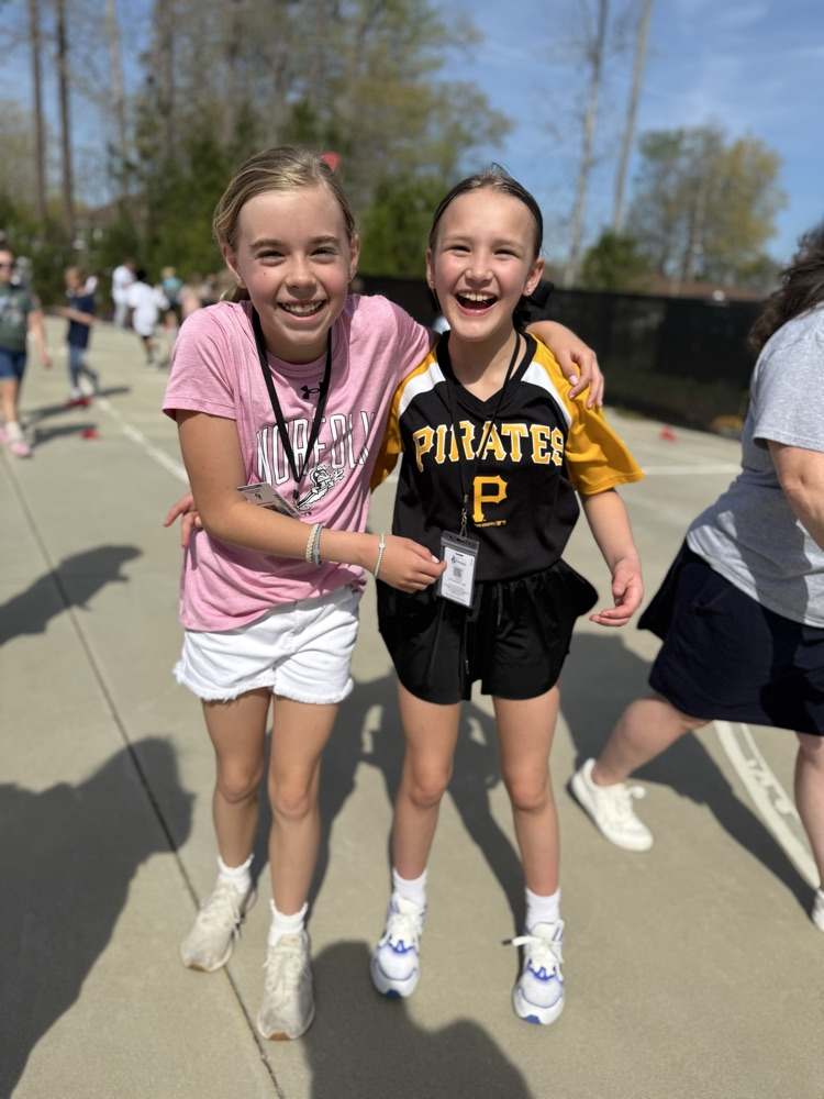 Friends, smiling posing after the fun run