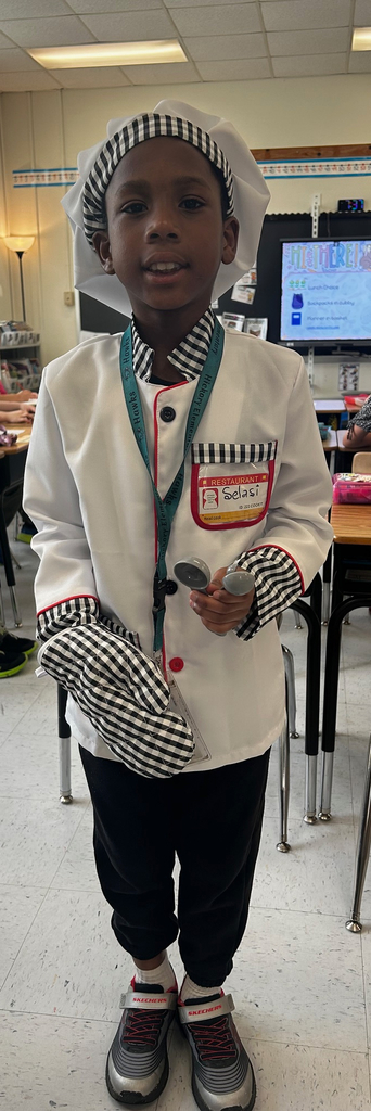 student dressed up as chef for career day 