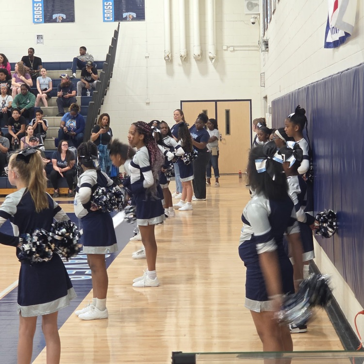 cheerleaders watching the game