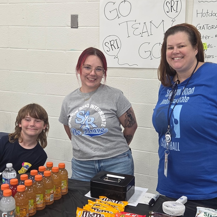 PTA and student seeking snacks at the concession stand 
