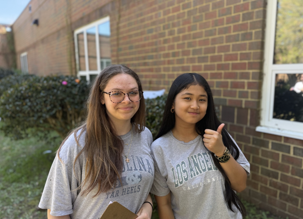 Students participating in an egg hunt outside in the courtyard