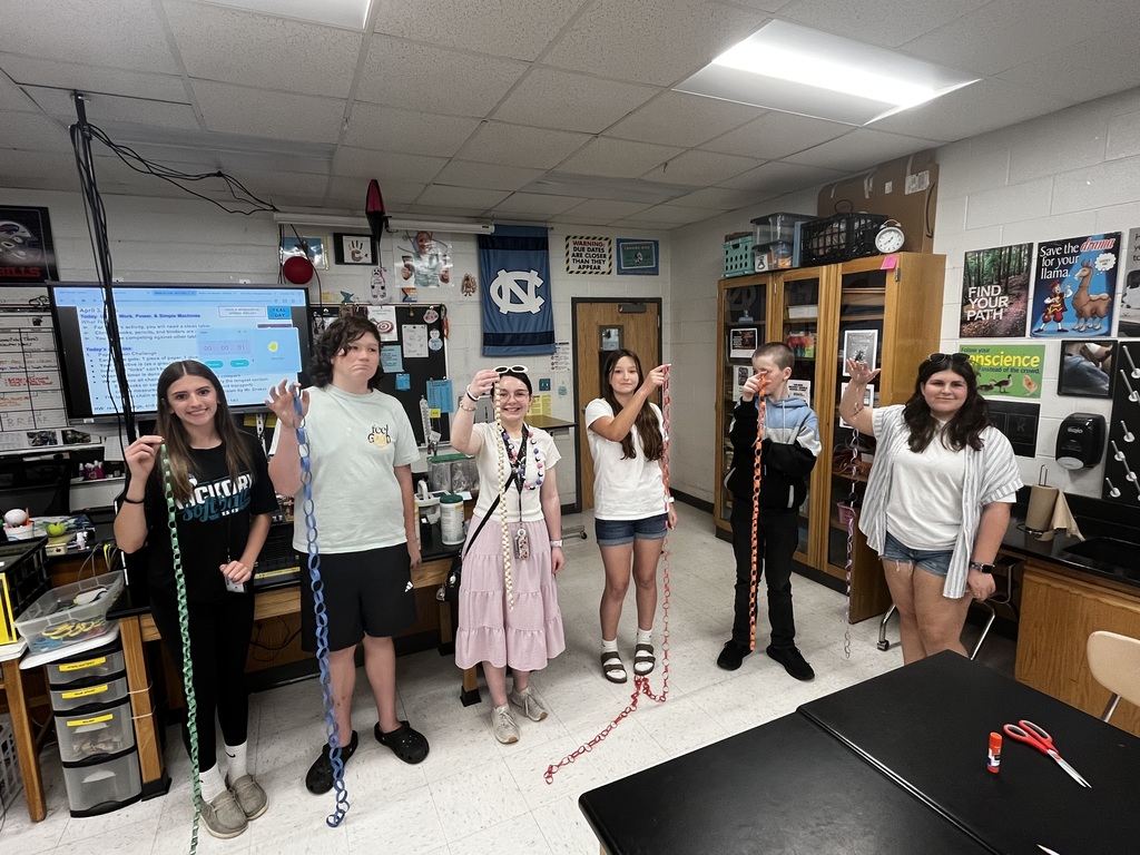 Students displaying their paper chains