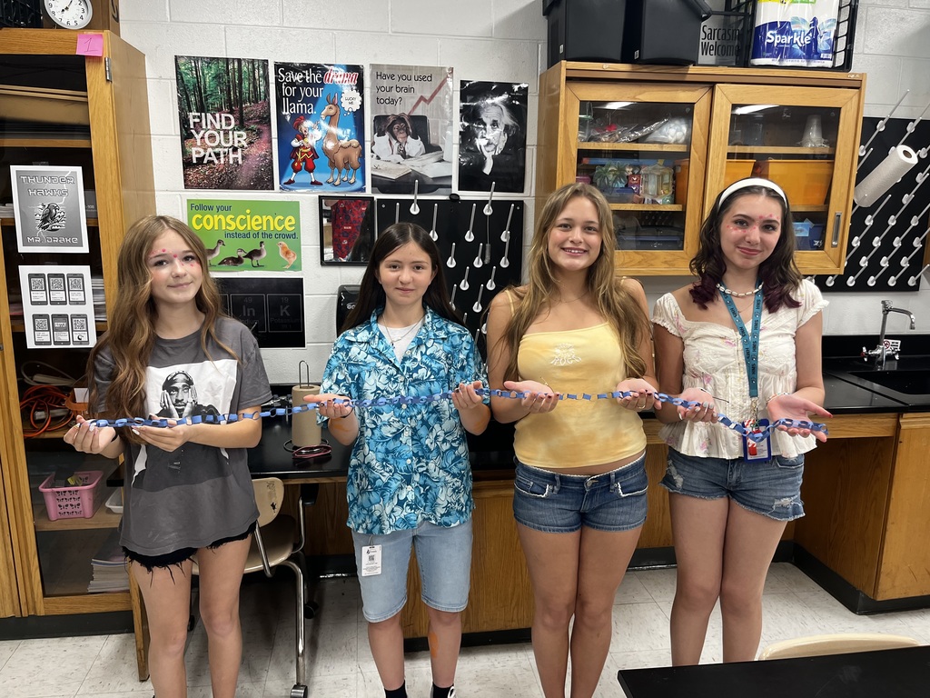 Students displaying their paper chains