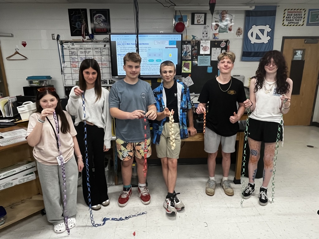 Students displaying their paper chains