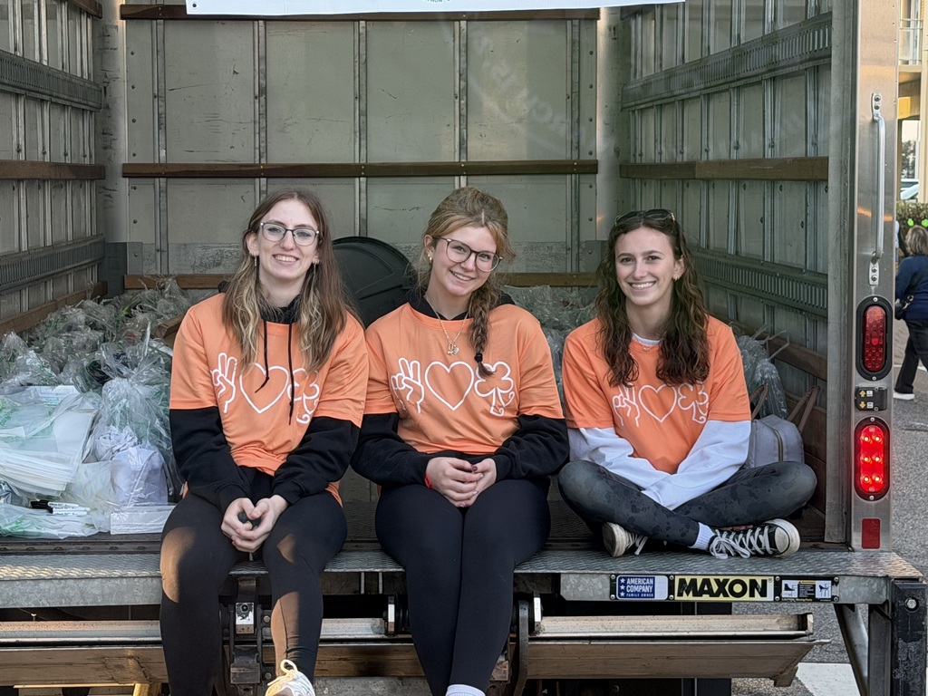 DCHS Choral students assisting with dry bags at the Shamrock-n-Run in Virginia Beach.