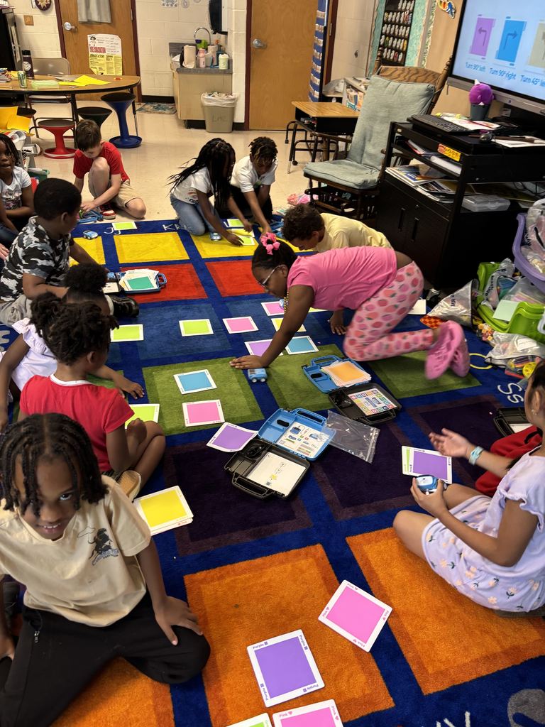Krell's 1st graders working with robots.