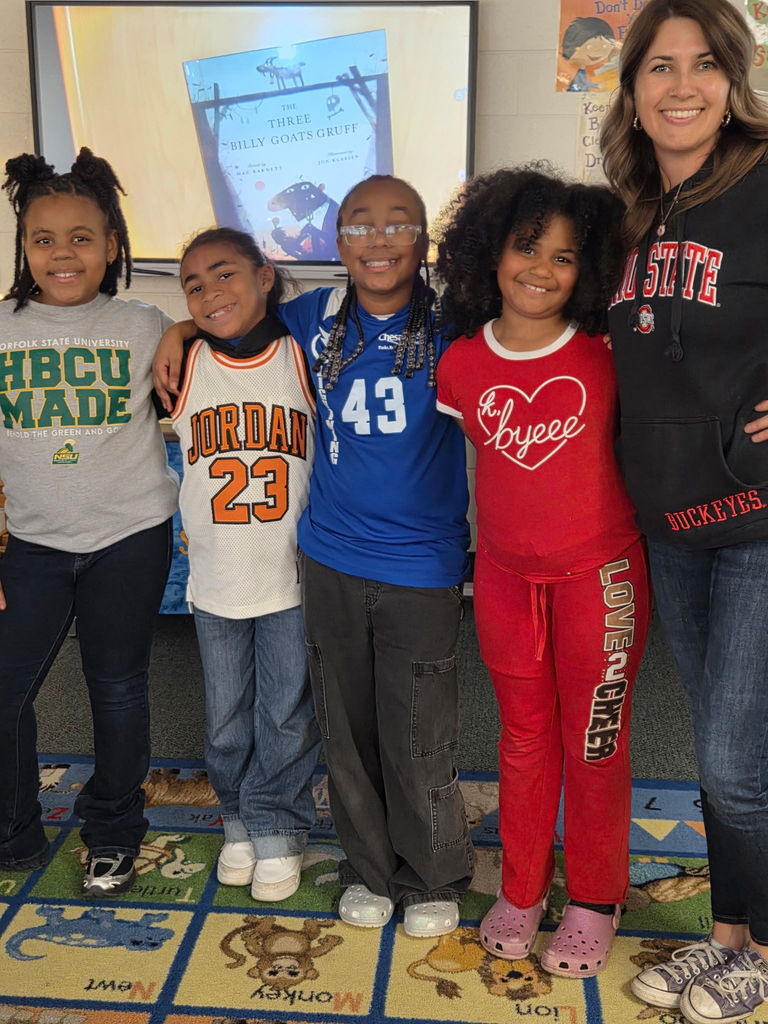students and teachers wearing reading shirts