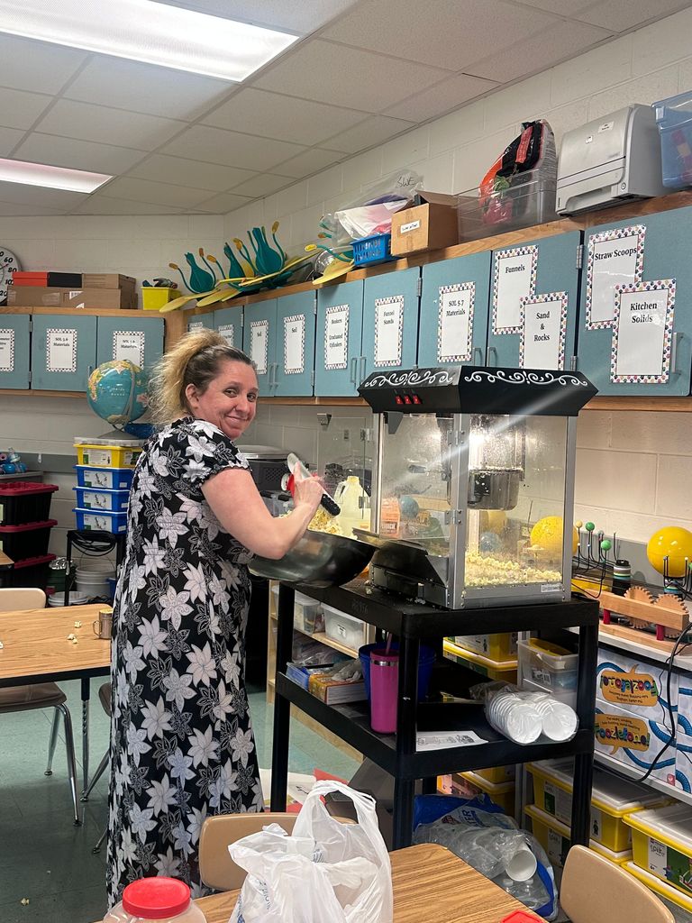 volunteers making popcorn