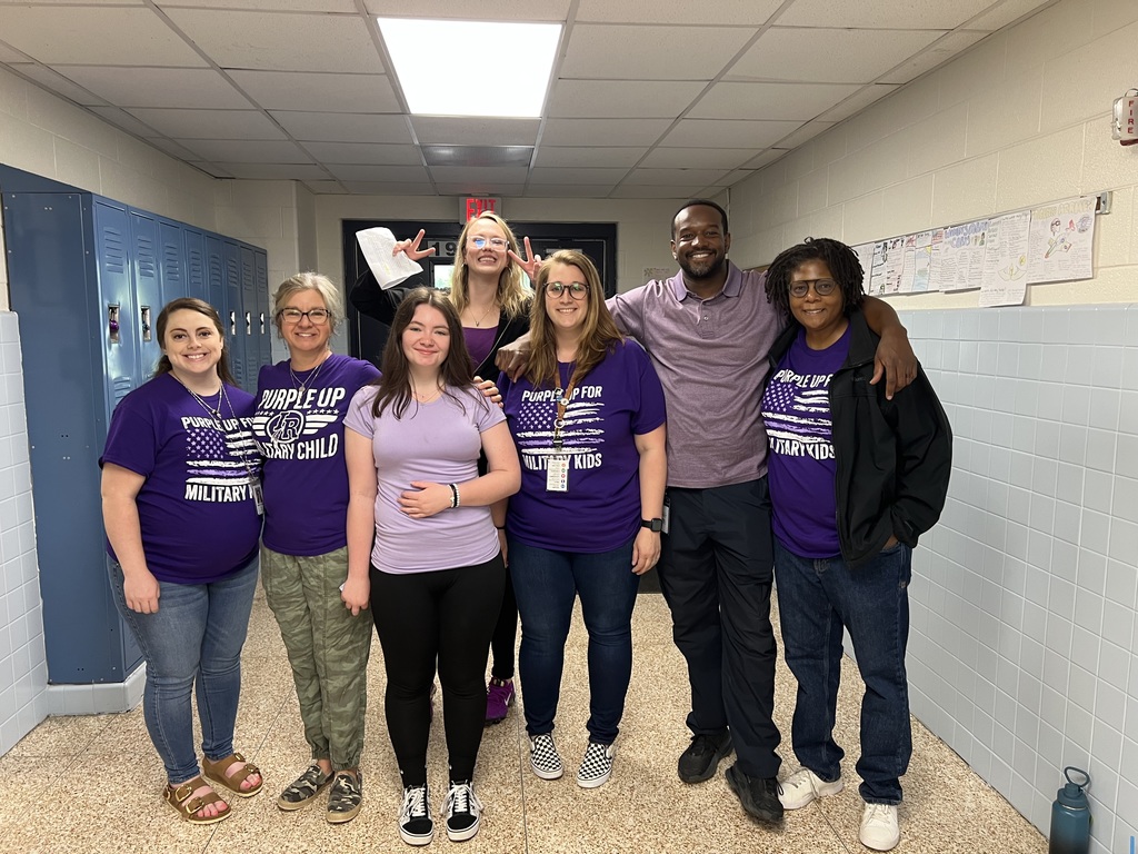Students and staff at Indian River MIddle School wearing purple for purple up day to support military children