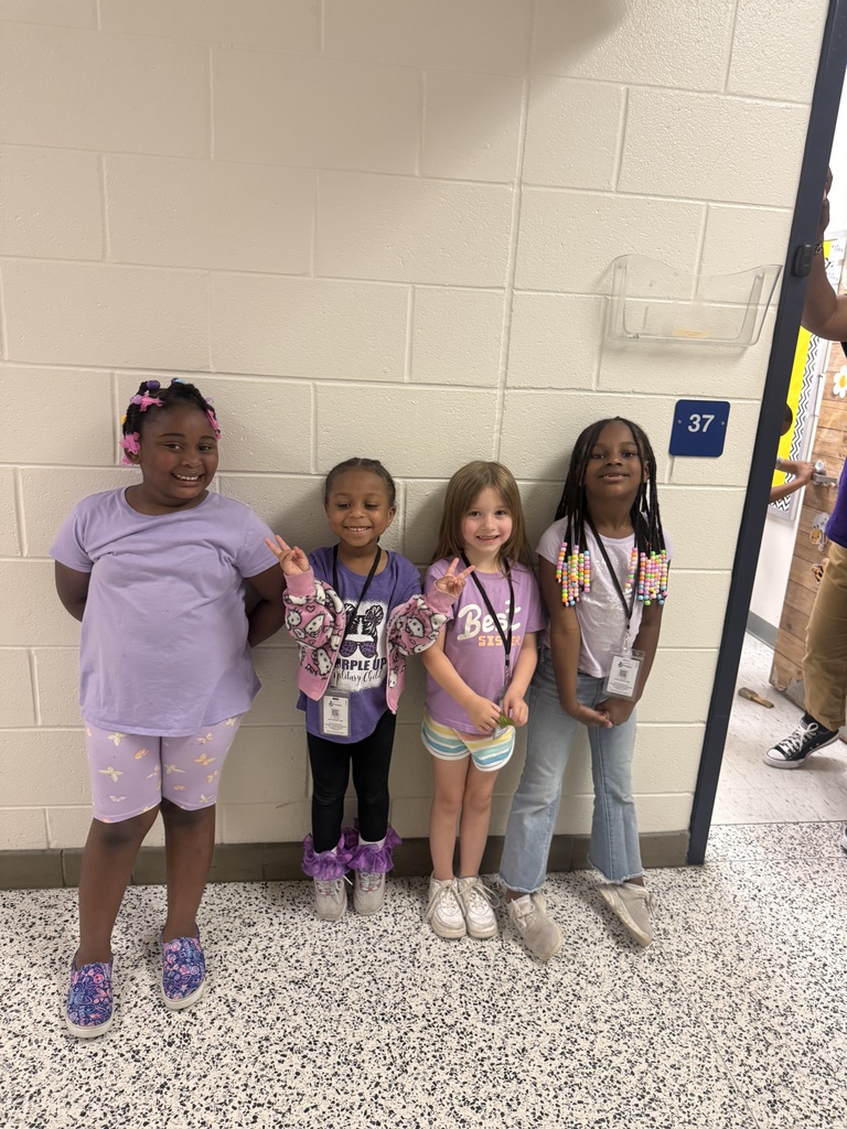 students wearing purple for purple up day