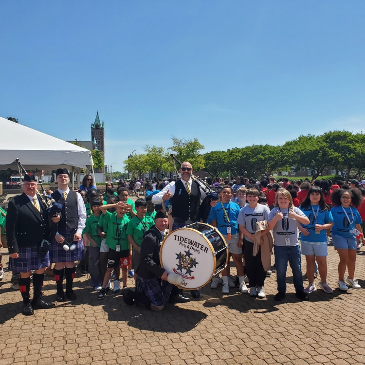 Students posing with band members.