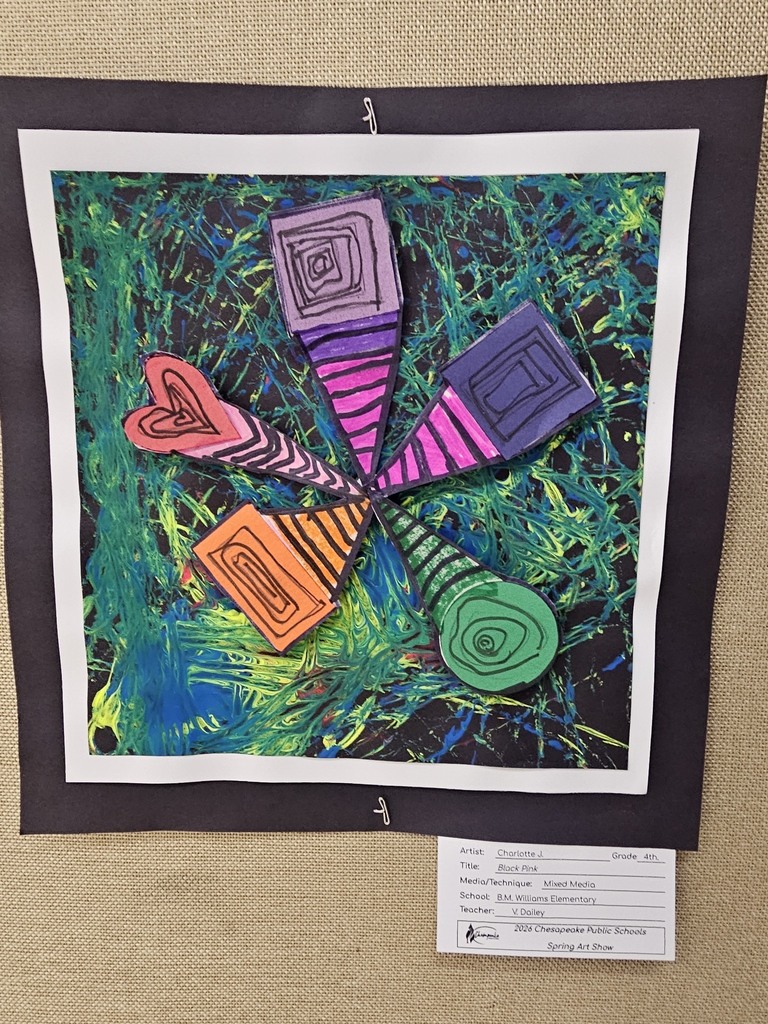 Student artwork on display. Colorful pinwheel