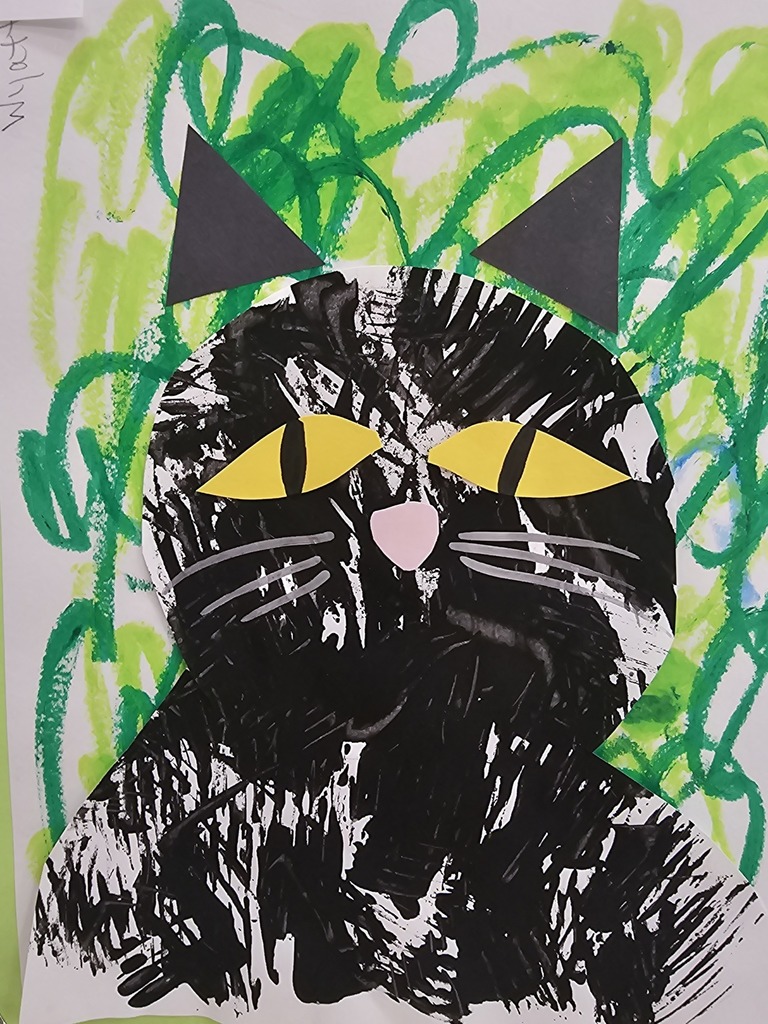 Student artwork on display - black cat sketch