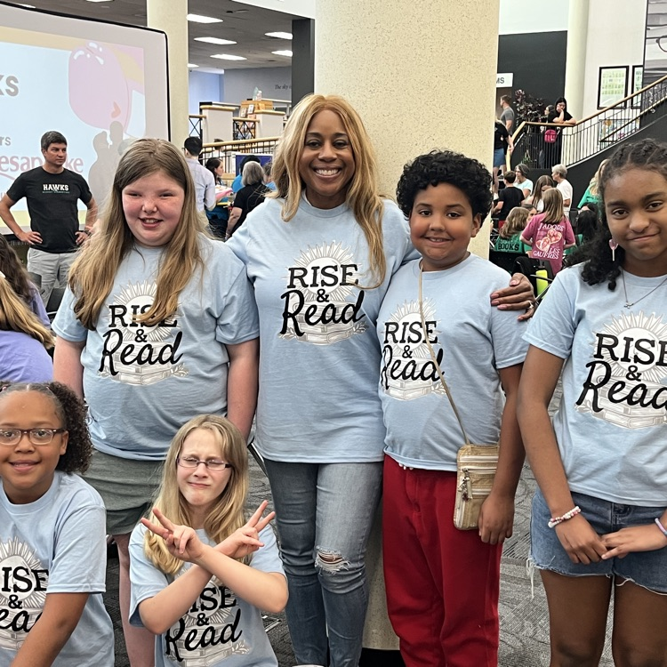 Ms. Alexander proudly standing with the RISE and Read team. 