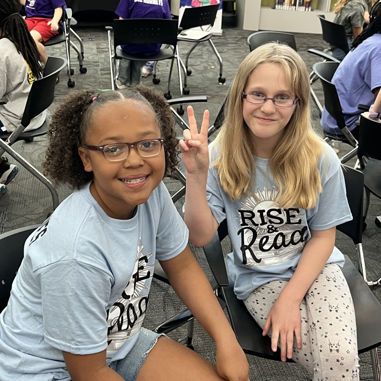 two students from the team excited about the competition. 