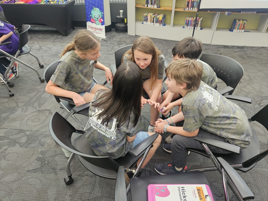 Battle of the Books Team talking through a question 
