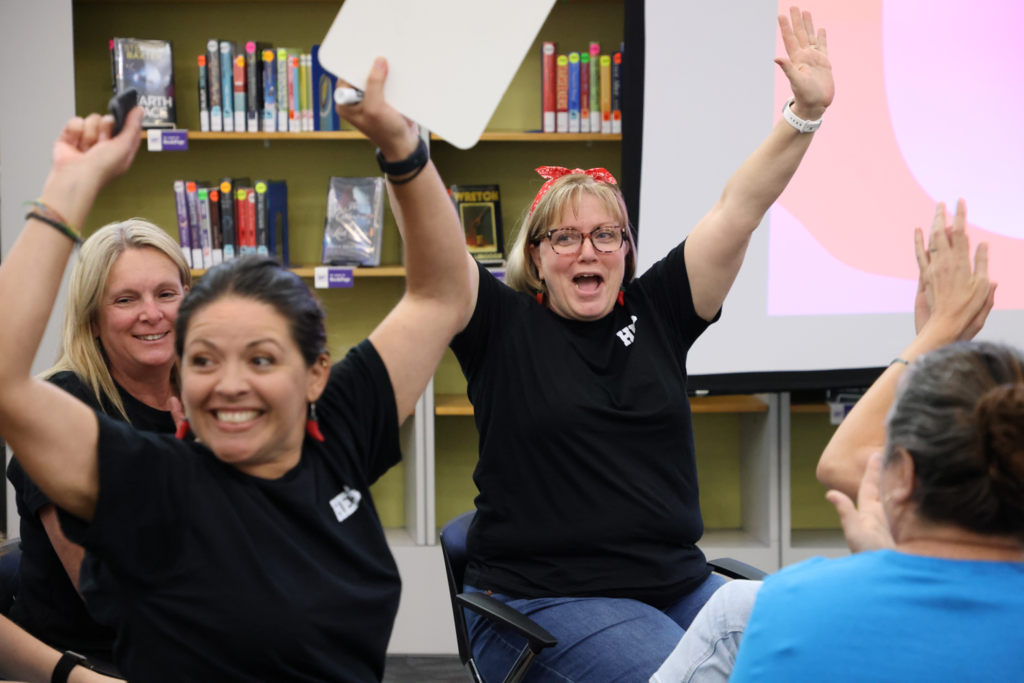 Teachers celebrate a win
