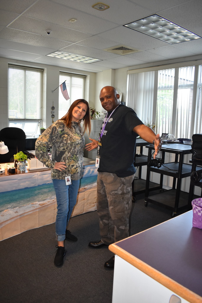 Two Teachers wearing camo to celebrate the month of the military child. 